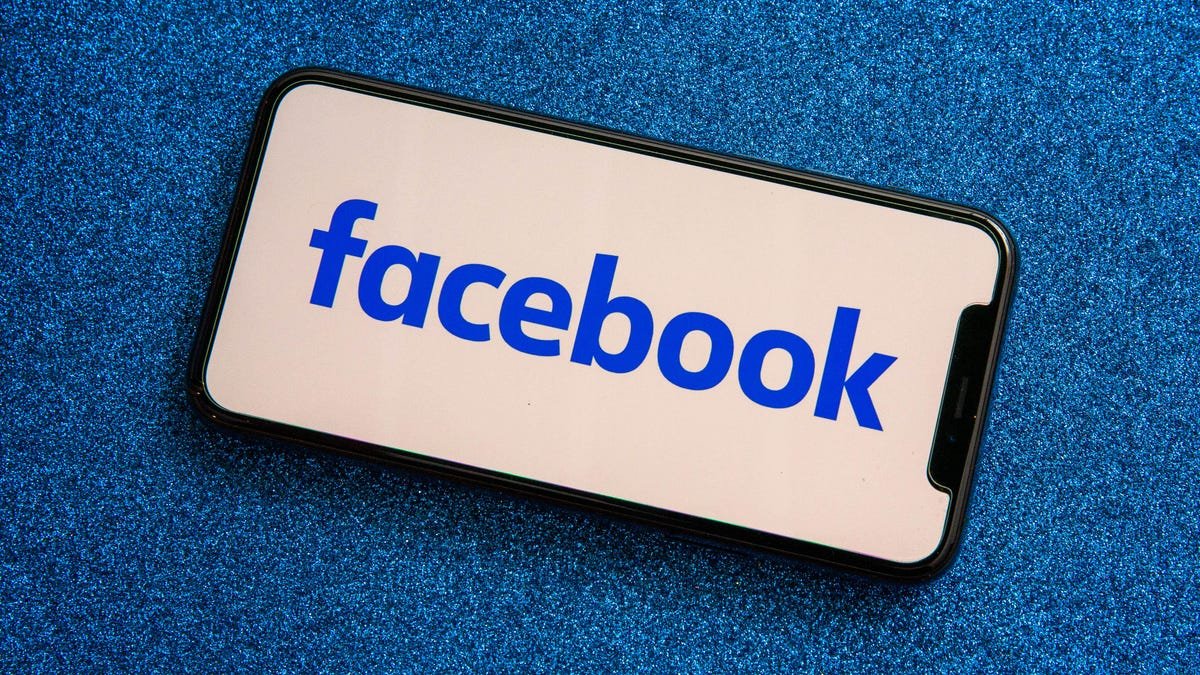 Facebook app icon displayed on a smartphone, illustrating Facebook Marketplace's digital commerce platform